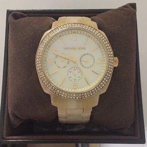 Michael Kors women's gold & tortoise watch.